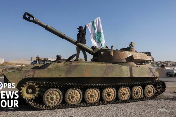 Hama falls to rebels! ⚔️ Assad's grip weakens as opposition forces surge.  Videos reveal shocking frontline battles & Russia's potential role. Click to uncover the truth!