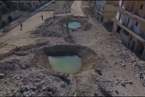 Drone's eye view of shattered Aleppo . Uncover the scars of war. Click to witness the devastation.