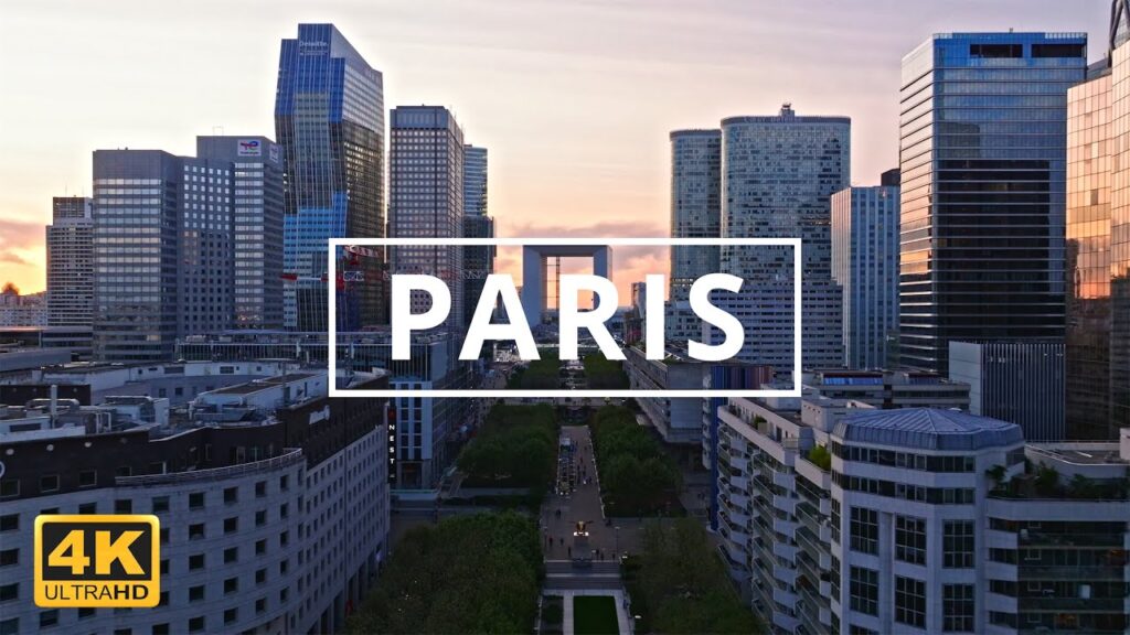 Soar above Paris!  Drone footage unveils iconic landmarks & hidden gems.  Experience the City of Light like never before.  Hit play!