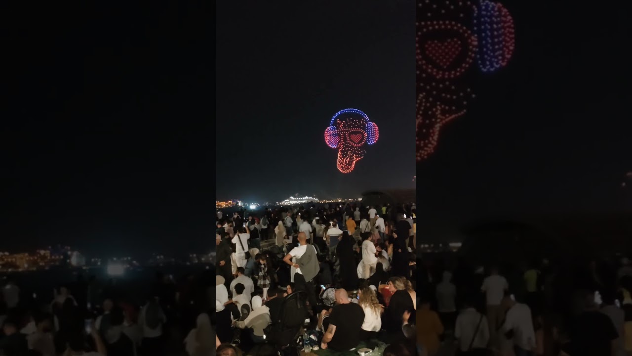 Dubai's drone dance!  Painting the skyline with pixels.  Iconic Burj Khalifa & mesmerizing drone shows.  Click to soar above the desert sands!